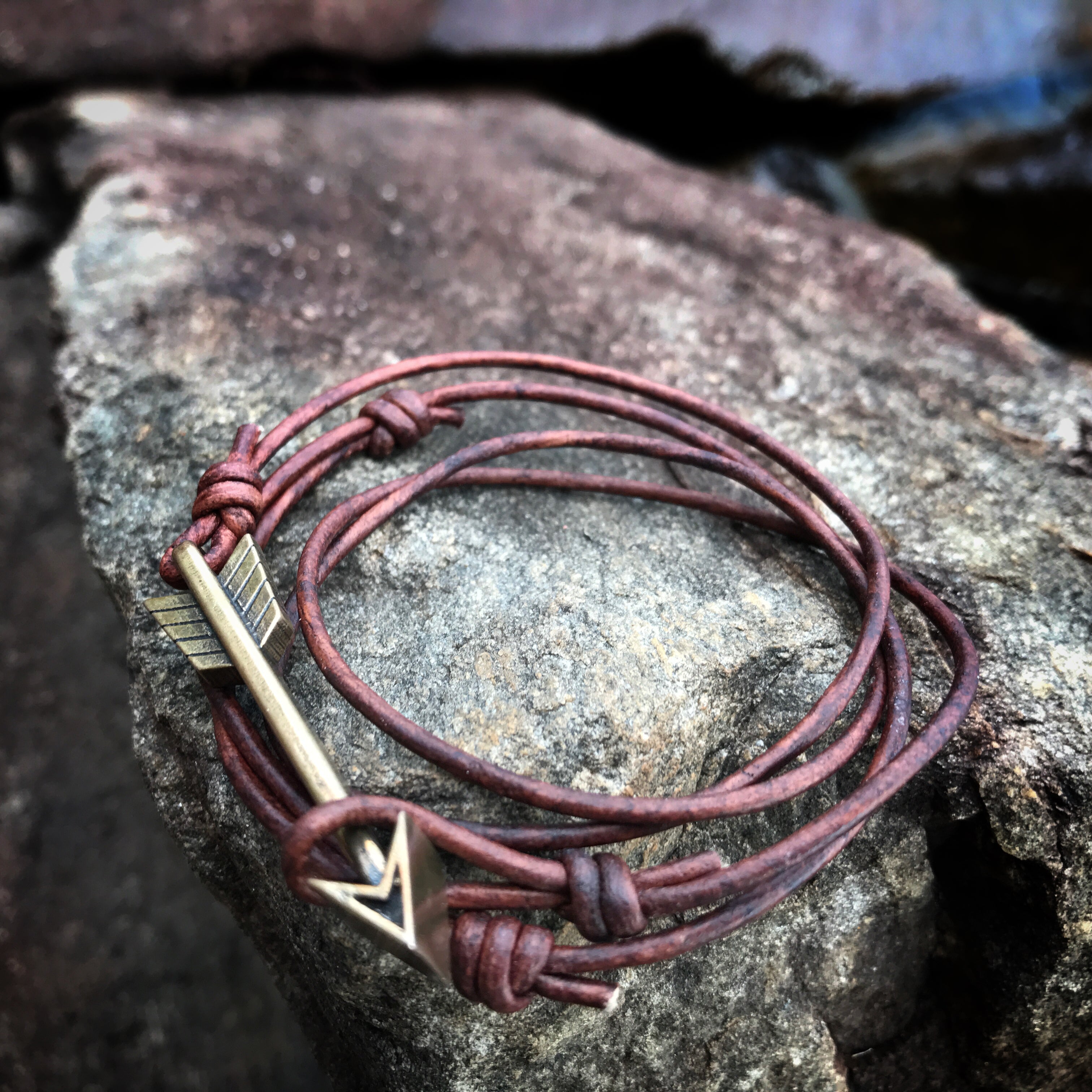 STRENGTH Arrow of Courage Bracelet - Bronze on Leather Cord